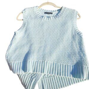 Woman's Banana Republic chky minimalist tight knit a-symmetrical hem sweater S/P